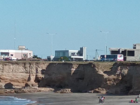Playa Dorada, REBAJADO Estar y 1 dorm para 4 pers frente al mar, jardín parrilla